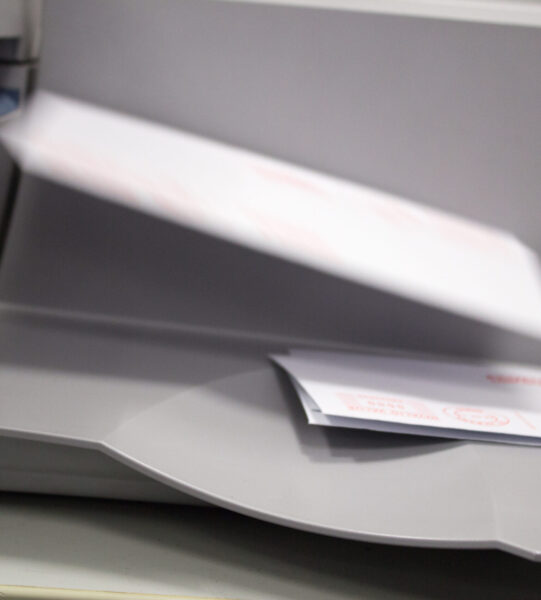 Letters exiting a franking machine
